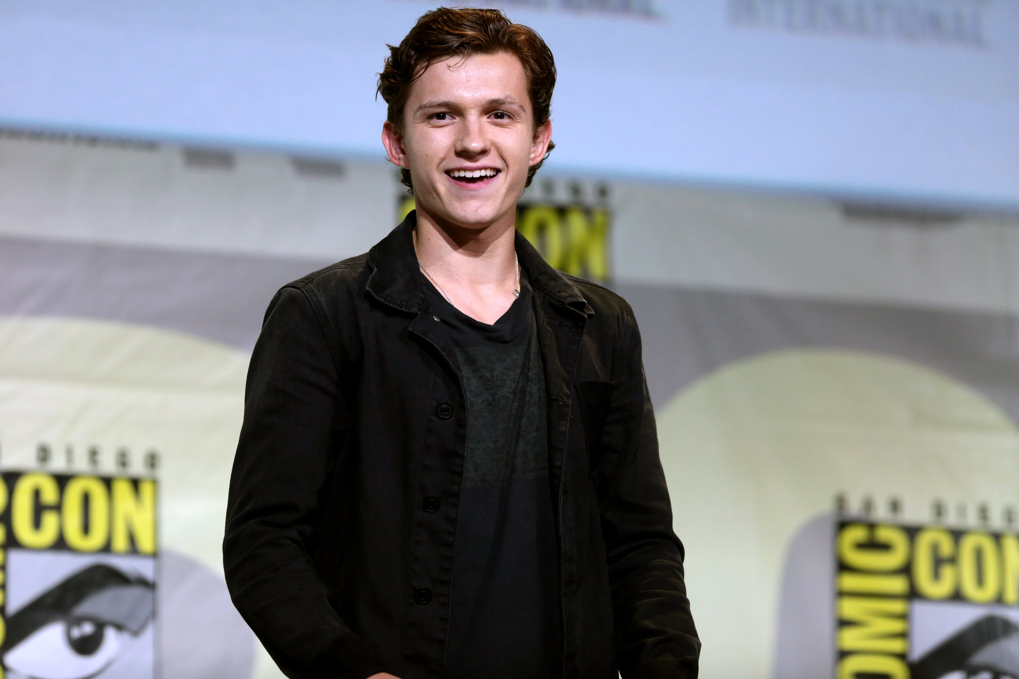 Tom Holland shares how a drunken phone call and a few tears have saved Spiderman amidst the planned Disney-Sony split.