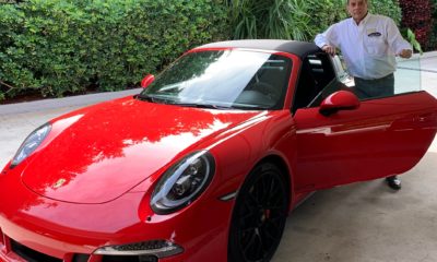 Keith A Gray with his red Porsche 911 GTS